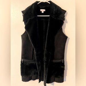 Black fluffy velvet and suede vest. Longer length.